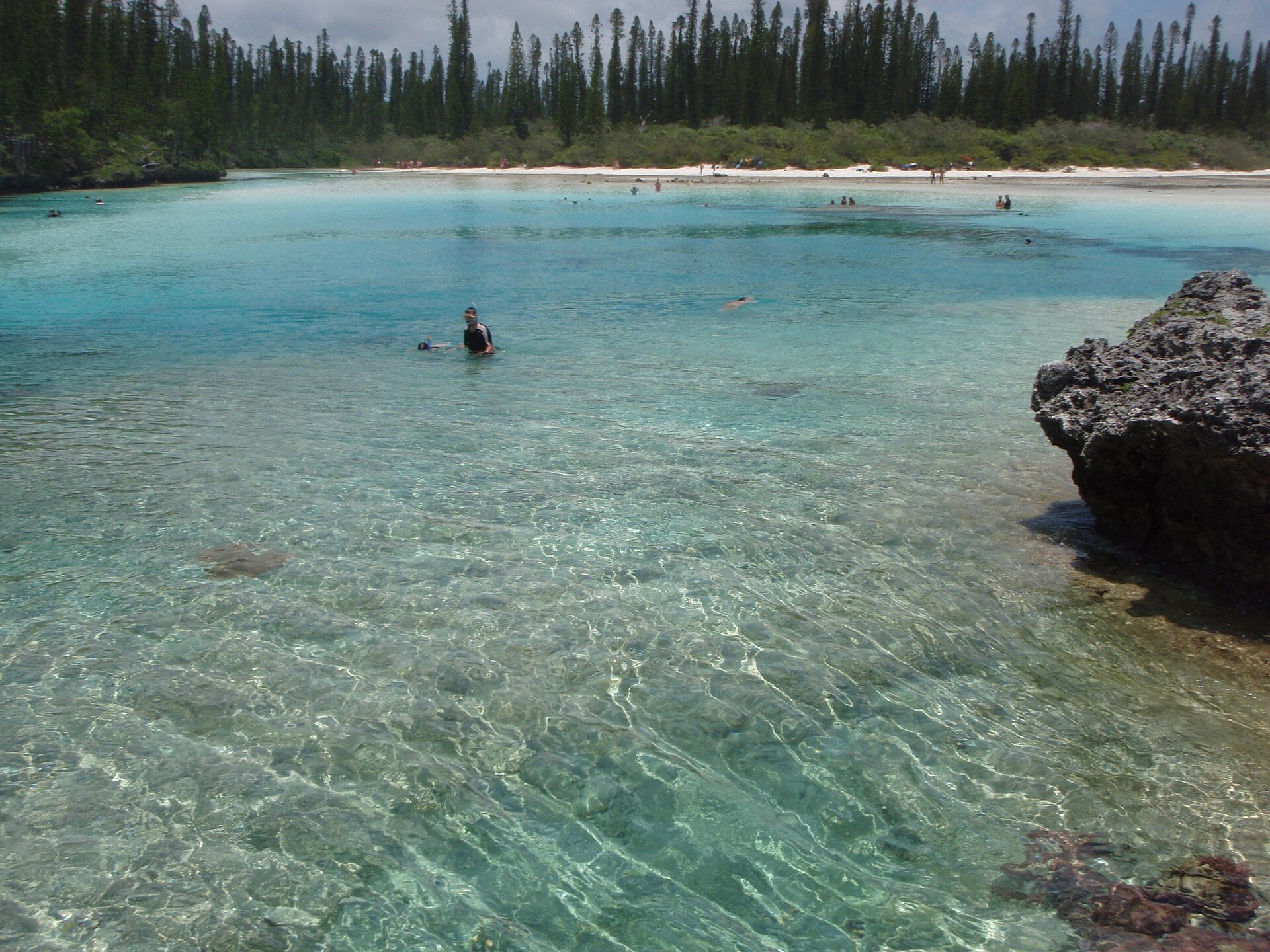 View of the natural aquamarine lagoon of Oro, Île des Pins, New Caledonia.
